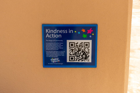 Hamilton, New Zealand - January 04, 2024: A Kindness in Action sign at the Magical Bridge Playground...