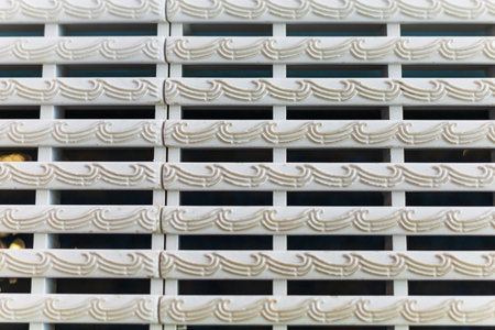 Intricate Patterned Vent Cover with Wavy Designの写真素材