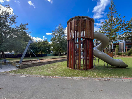 Wooden Tower with Spiral Slide and Flying Fox in Parkの写真素材