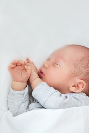 Newborn baby sleeping peacefullyの写真素材