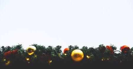 Christmas balls hanging on a Christmas tree. Christmas tree background with copy space. Christmas in Europe. Outdoor Christmas decorations.の写真素材