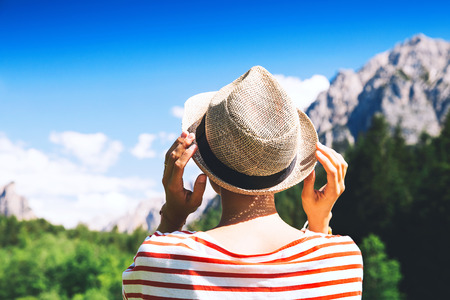 Hiker woman outdoors on nature. Travel at Dolomites, Italy, Europe. Summer holiday in South Tyrol....