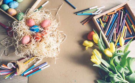 Happy Easter! Paints, felt-tip pens, flowers, decorations for coloring eggs for holiday -  easter...