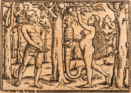 Adam and Eve beneath an apple tree. Ancient illustrationの写真素材