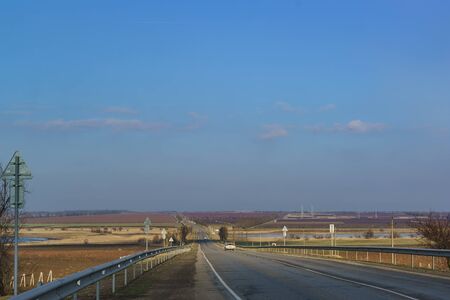 Winter road into the distance over the hills of the Taman Peninsulaの写真素材
