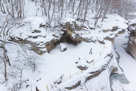 KAMENNOMOSTSKIY, ADYGEYA, RUSSIA - January 29.2017: Equipped with the fence the tour route on the territory of the hadzhohskaya tasnina canyon, a scenic gorge of the White riverのeditorial素材