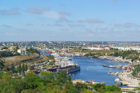 Russia, Crimea, Sevastopol - September 05.2017: on the seaside of the city and the South Bay with the naval ships of Russia from height of bird's flightのeditorial素材
