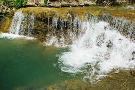 Stone ledges of the pure mountain river Zhane in the Caucasus mountains. Russia, Gelendzhik, village Vozrozhdenieの写真素材
