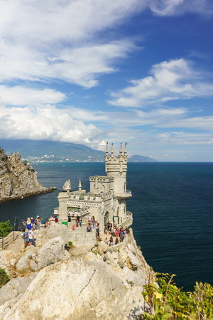 Russia, Crimea, Yalta, Gaspra-September 10, 2018: Tourists visiting the old Gothic castle swallow's Nest on the southern coast of Crimea. Sunny summer day at Cape Auroraのeditorial素材