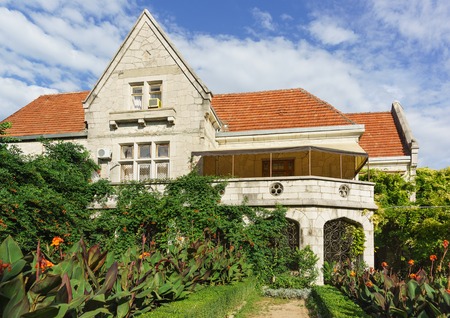 Gaspra, Yalta, Crimea, Russia-September 10, 2018: view of the Palace Haraks-manor house with Park area. Excursion attraction on the territory of the sanatorium "Dnepr"のeditorial素材