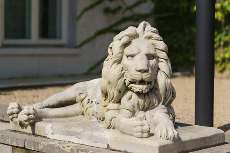 Koreiz, Yalta, Crimea, Russia-September 13, 2018: marble sculpture of the terrible lion, lying in front of the main entrance to the Yusupov Palace, built in the XIX century by architect Krasnovのeditorial素材
