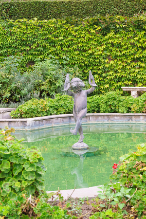 Koreiz, Yalta, Crimea, Russia - September 13, 2018: Sculpture-fountain boy with fish in the pond of Yusupov Palaceのeditorial素材