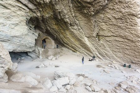 Novy Svet, Crimea, Russia - March 09, 2019: Tour group in the Golitsyn-equipped storage for bottles of wine in the huge and most famous of the caves named after Chaliapin, who spoke hereのeditorial素材