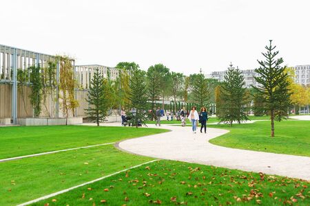 Krasnodar, Russia - October 19, 2019: People walking in the Park of the Galician. Exotic Araucaria Chilean and winding pathsのeditorial素材