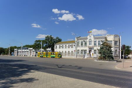 Evpatoria, Crimea, Russia-September 8, 2019: a Tram rides along Lenin Avenue past the administration...