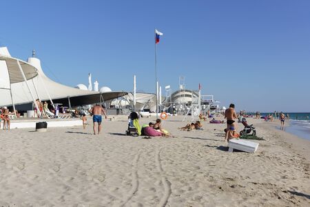 Popovka, Saki district, Crimea - 10 September 2019: People on Z. City beach on The black sea coastのeditorial素材