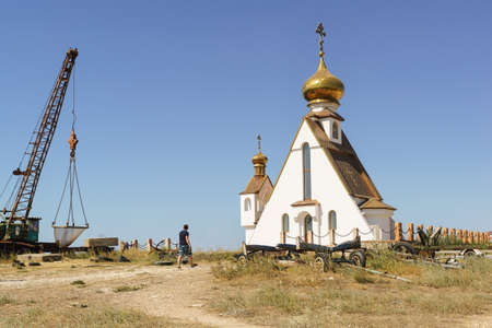Tarkhankut, Crimea, Russia-September 11, 2019: Fishing camp on Cape Bolshoy Atlesh. Chapel of Saint...