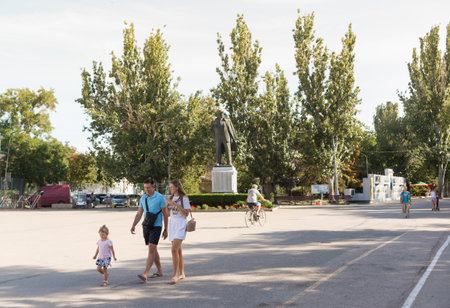 Russia, Crimea, Feodosia September 18, 2020-People on the forecourt of the resort town Gorky Street. Monument to Vladimir Ilyich Leninのeditorial素材