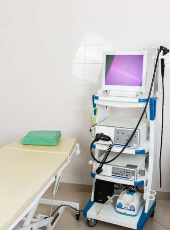 Russia, Slavyansk-on-Kuban: May 05, 2021-Medical equipment for video esophagogastroduodenoscopy in the clinic premises Neovo, AOHUA. A patients couch and a stand with a gastroscope and a monitorのeditorial素材