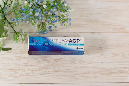Russia, Krasnodar - November 22, 2022: A box of cosmetic preparation IAL-system ACP lies on a white wooden table. copy spaceのeditorial素材