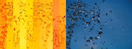 Yellow banners and blue background with liquid splashの写真素材