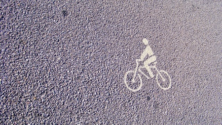 Bike draw icon on street texture background