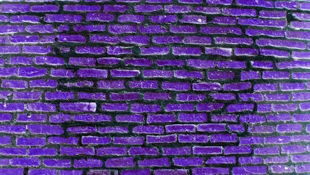 Violet dark brickwall texture backgroundの写真素材