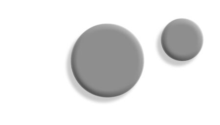 Two grey circular balls isolated on white one close other farの写真素材