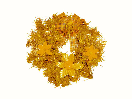 Gold christmas circular ornament with flowers isolated on whiteの写真素材