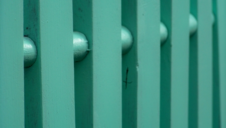 Emerald green wood fence abstract background of vertical stripedの写真素材