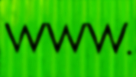 Blured www  black letters zigzag on abstract brilliant green striped backgroundの写真素材