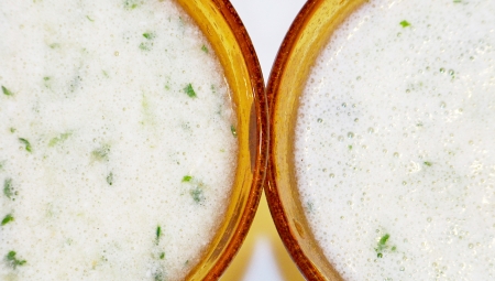Detox white and green smoothies couple close up from top viewの写真素材