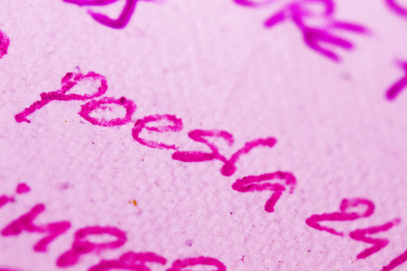 Pink poetry in spanish close upの写真素材