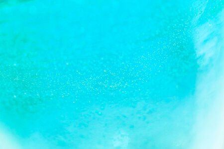 Turquoise blue small bubbles abstract backgroundの写真素材
