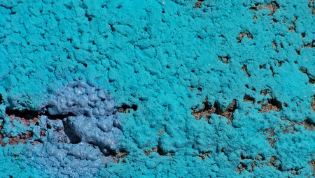 Turquoise blue wall textured background closeupの写真素材
