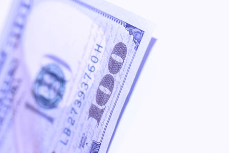 Blue one hundred bill close up isolated on whiteの写真素材
