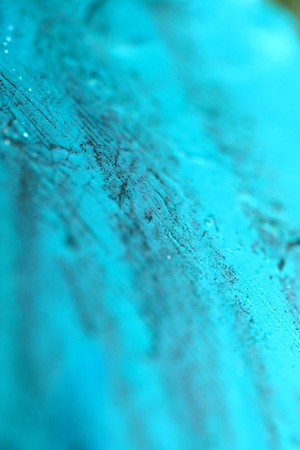 Turquoise paint brushes blurred abstract background