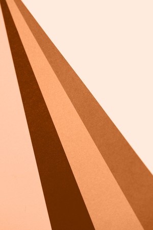 Brown and beige sober palette of colors in diagonal lines abstract backgroundの写真素材