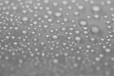 Grey water drops closeup abstract background textureの写真素材