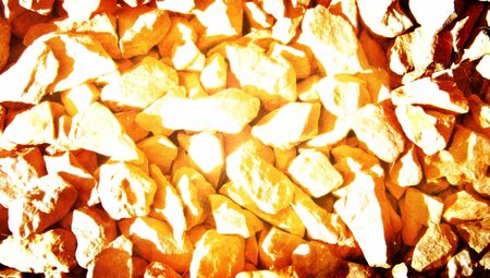 Gold stones close up abstract backgroundの写真素材