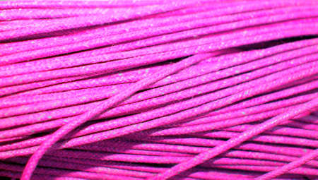 Pink yarn close up textile abstract backgroundの写真素材