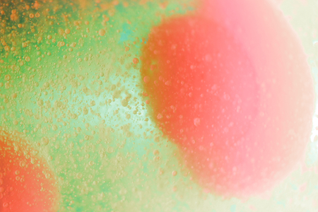 Cocktail drink abstract liquid background of drops and bubbles colorsの写真素材