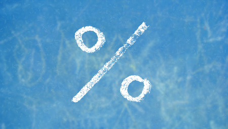 Percentage symbol on blue class chalk board background