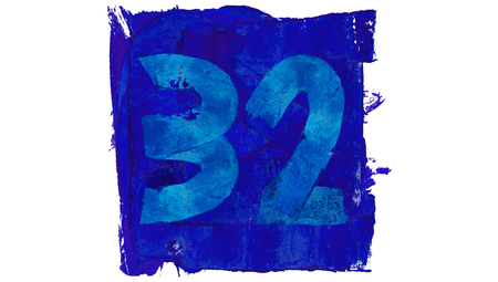 Number 32 painted with blue paintの写真素材