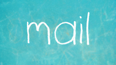 Mail word on blue boardの写真素材