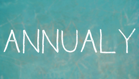 Annualy word written with chalk lettersの写真素材