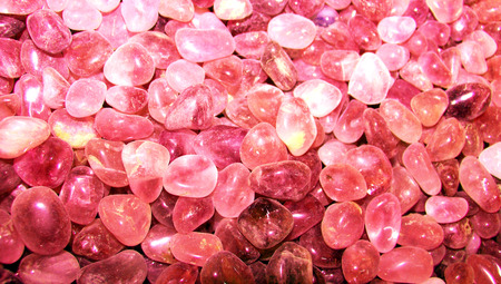 Pink rodhocrosite semiprecious stones background texture