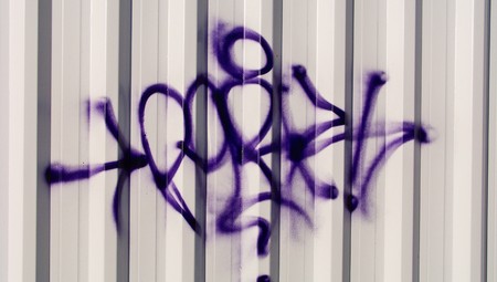 Grafitti on striped abstract backgroundの写真素材