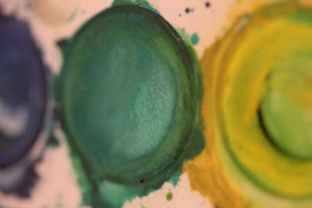 Green watercolor painting palette close upの写真素材