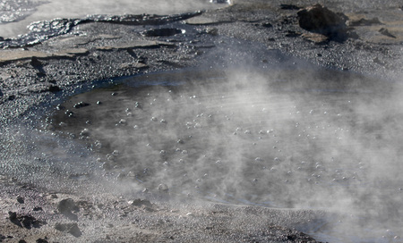 Iceland geothermal. Namafjall - area in field of Hverir. Landscape which pools of boiling mud and hot springs. Tourist and natural attractionsの写真素材